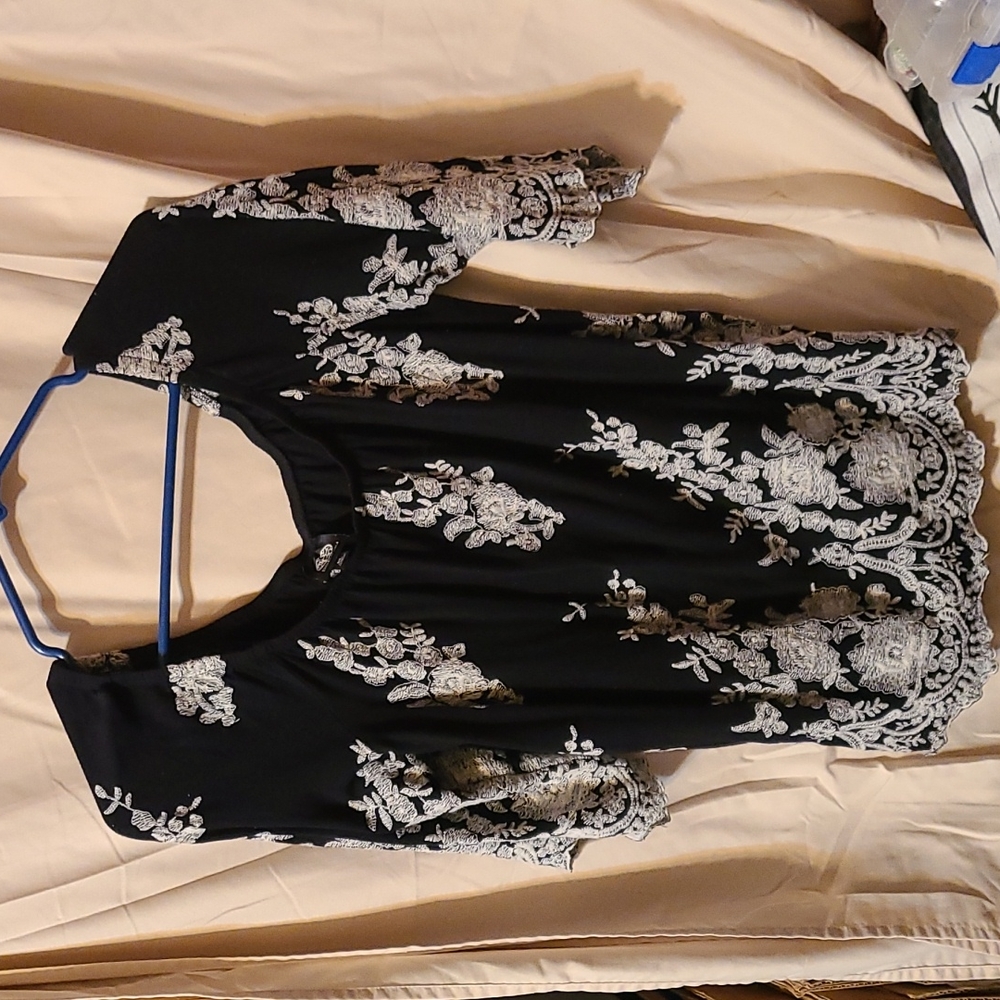 Embroidered top size med.
